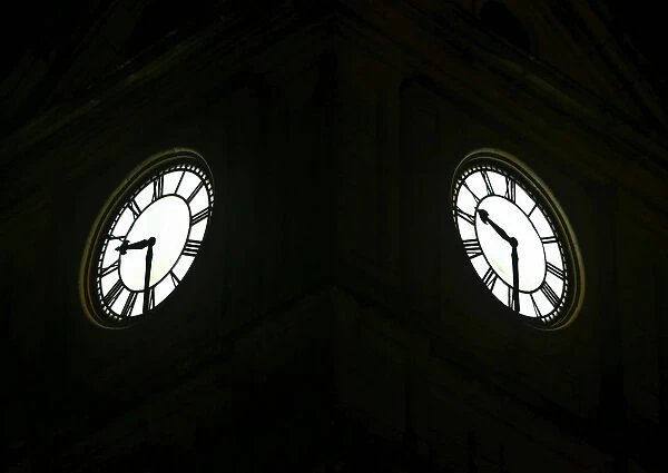 The clock faces on the Pembroke Clock Tower are seen in Pembroke