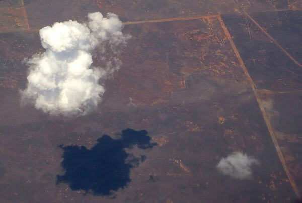 A clouds floats above agricultural farming land in south-western New South Wales
