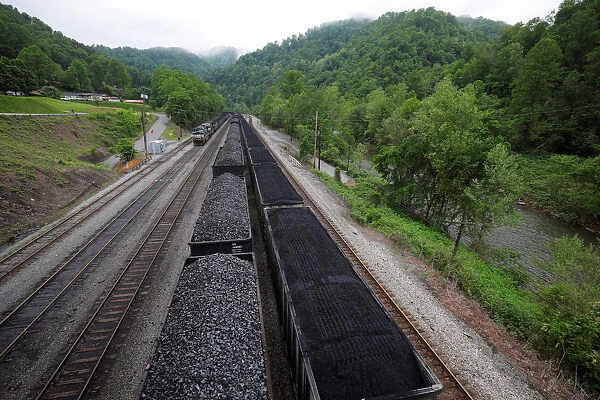 Coal sits in train cars on tracks in Grundy, Virginia