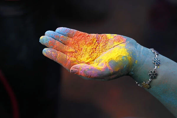 Coloured powder is seen in a participants hand during The Color Run in Caracas