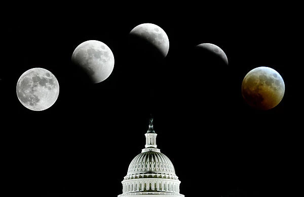 Composite photo picturing the lunar eclipse in the sky over Washington DC