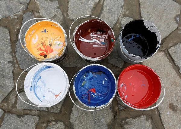 Containers of colours, prepared by Artlords which are used to paint graffiti on the