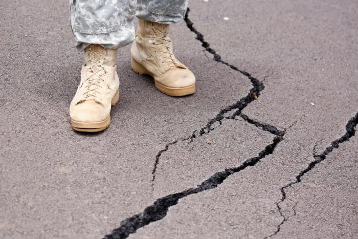 Framed Print : Cracks are visible along a road in the Leilani Estates subdivision during ongoing Framed Print : Cracks are visible along a road in the Leilani Estates subdivision during ongoing