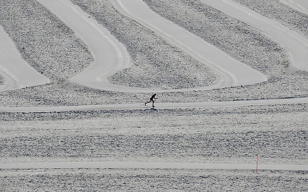 A cross country skier is seen on the Dachstein glacier, as a heatwave hits the country