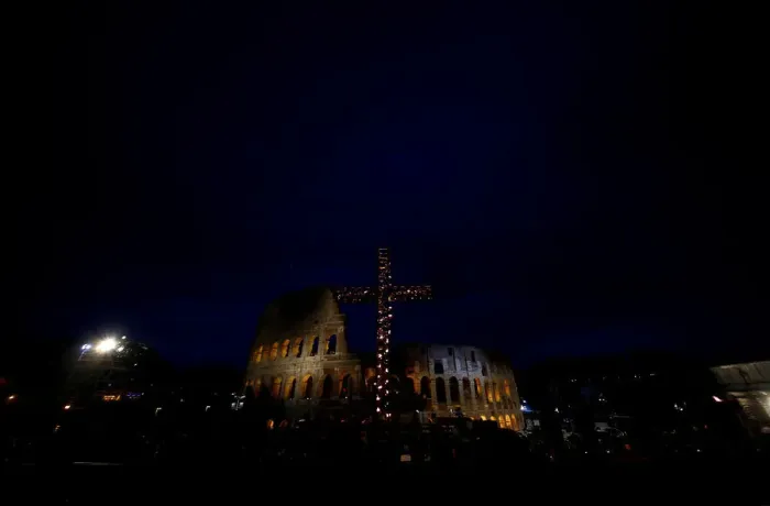 Framed Print : A cross lit up with candles is seen in front of the Colosseum before the Via Crucis Framed Print : A cross lit up with candles is seen in front of the Colosseum before the Via Crucis