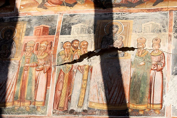A damaged fresco is pictured in The Orthodox Church of Saint Athanasios in Leshinca