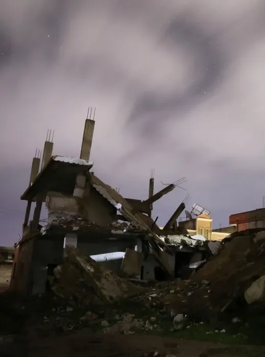 Framed Print : Damaged houses are pictured at night in the rebel-held area, in the city of Daraa, Syria Framed Print : Damaged houses are pictured at night in the rebel-held area, in the city of Daraa, Syria