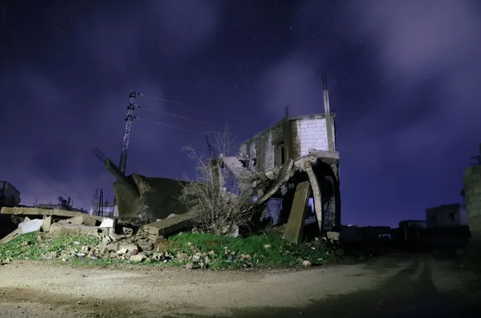 Framed Print : Damaged houses are pictured at night in the rebel-held area, in the city of Daraa, Syria Framed Print : Damaged houses are pictured at night in the rebel-held area, in the city of Daraa, Syria