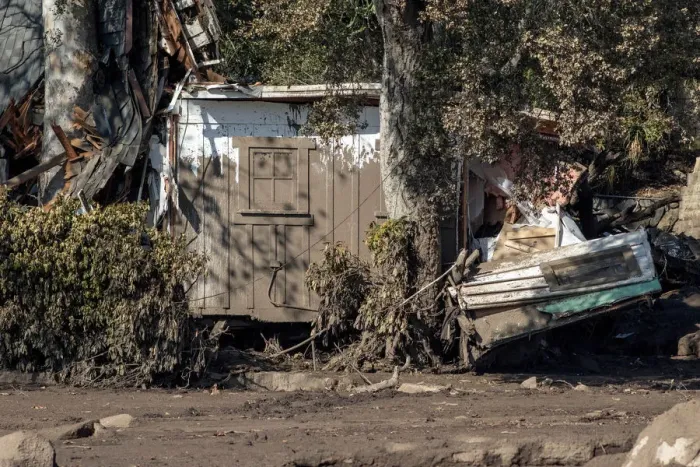 Framed Print : Damaged property pushed into a tree after a mudslide in Montecito, California