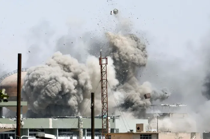 Framed Print : Debris fly as smoke rises after an artillery attack to the Islamic State militants Framed Print : Debris fly as smoke rises after an artillery attack to the Islamic State militants