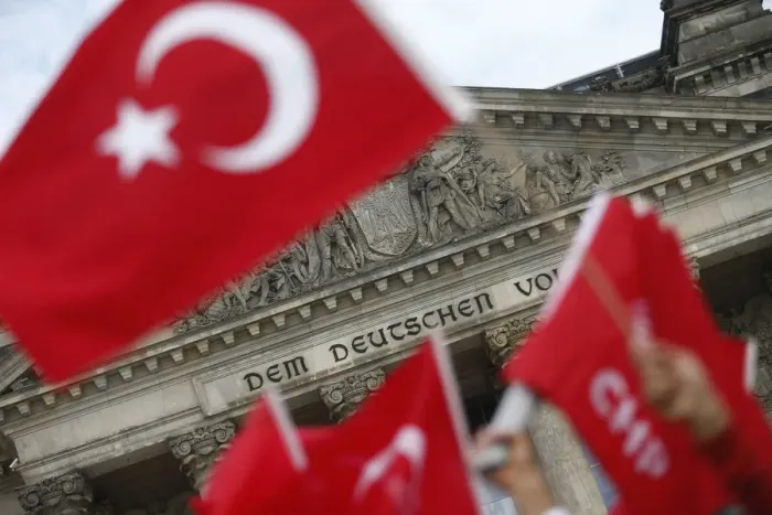 Framed Print : Demonstrators protest against resolution that labels the killings of up to 1