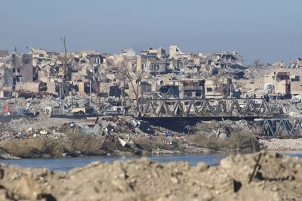 Destroyed buildings from previous clashes are seen in Mosul