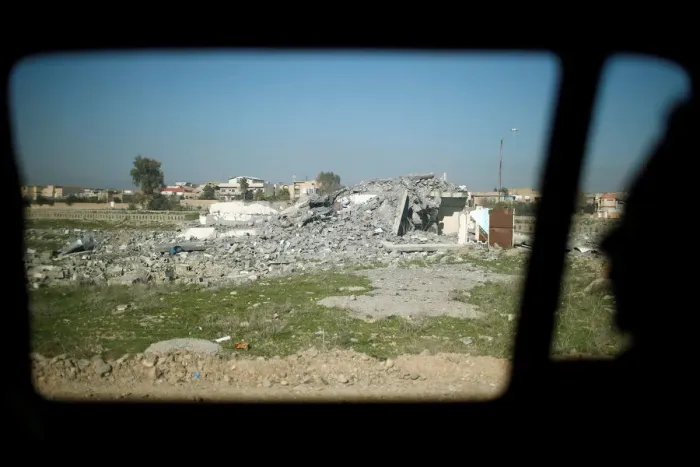 Framed Print : Destroyed house is seen through a car window in the eastern side of Mosul Framed Print : Destroyed house is seen through a car window in the eastern side of Mosul