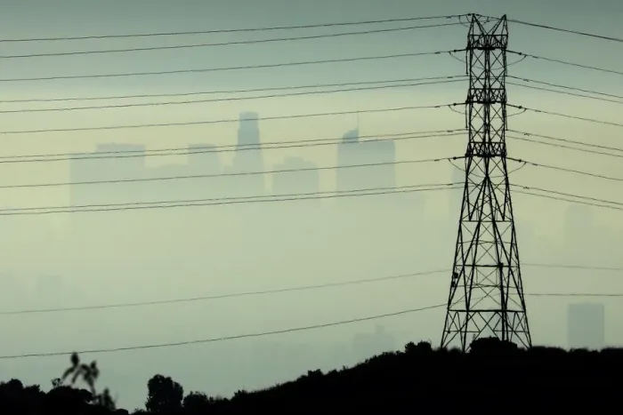 Framed Print : Downtown Los Angeles is seen behind an electricity pylon through the morning marine layer Framed Print : Downtown Los Angeles is seen behind an electricity pylon through the morning marine layer