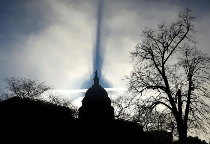 Framed Print : Early morning fog creates a shadow of the U. S. Capitol dome in Washington