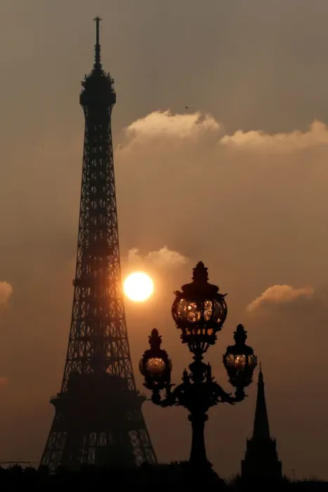 Framed Print : The Eiffel tower is pictured as the sun sets on a winter day in Paris Framed Print : The Eiffel tower is pictured as the sun sets on a winter day in Paris