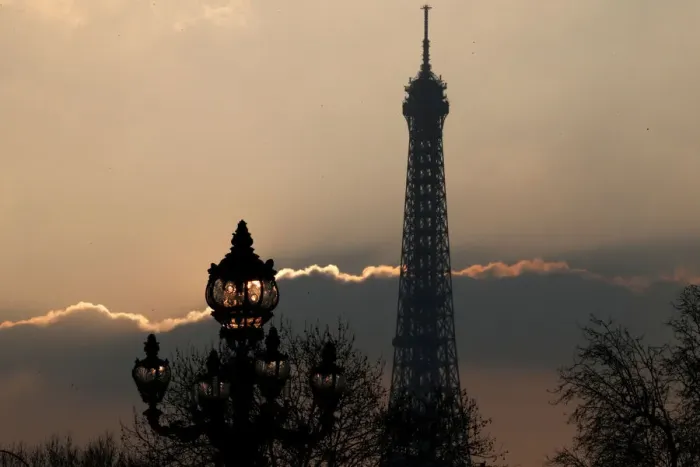 Framed Print : The Eiffel tower is pictured as the sun sets on a winter day in Paris Framed Print : The Eiffel tower is pictured as the sun sets on a winter day in Paris