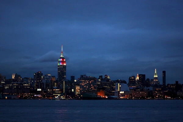 The Empire State Building is lit in rainbow colors during the celebration of the annual