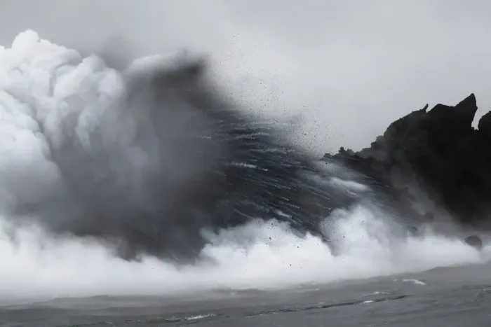 Framed Print : An explosion occurs when the lava hits the ocean during the eruption of the Kilauea