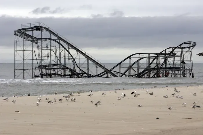 Framed Print : The extensive damage to an amusement park roller coaster in the aftermath of Hurricane