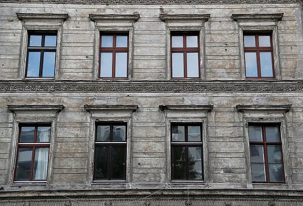 The facade of an unrenovated appartment building is pictured at Kreuzberg district in
