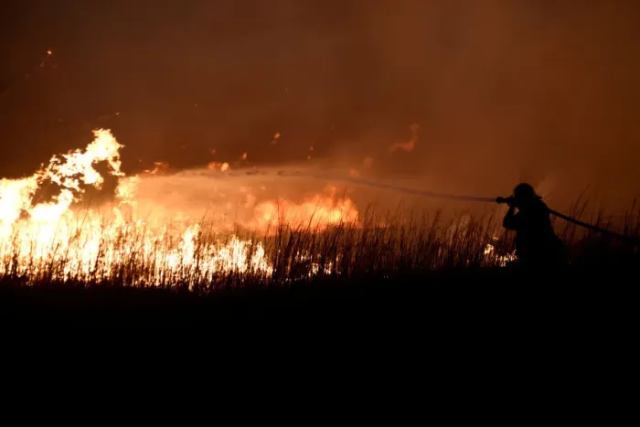 Framed Print : A firefighter works to control the Rhea fire near Seiling Framed Print : A firefighter works to control the Rhea fire near Seiling