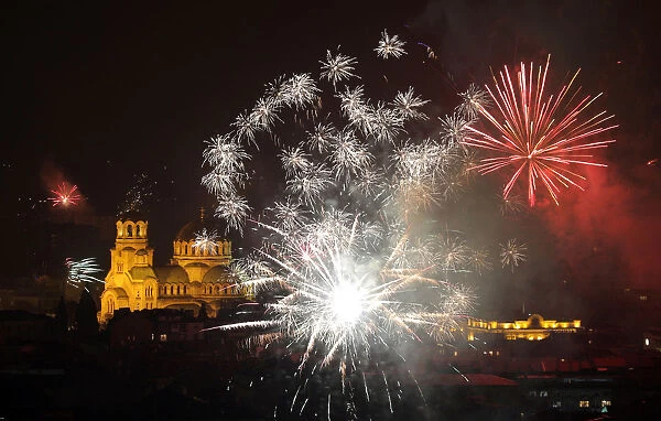 Fireworks explode over the Alexander Nevski cathedral during the New Year celebrations in