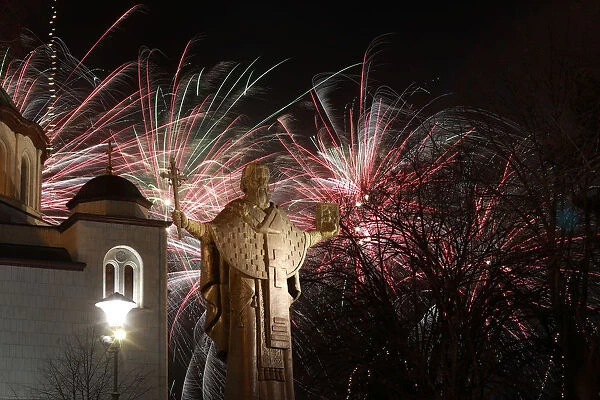 Fireworks explode over the St. Sava monument during the Orthodox Christian New Years Day