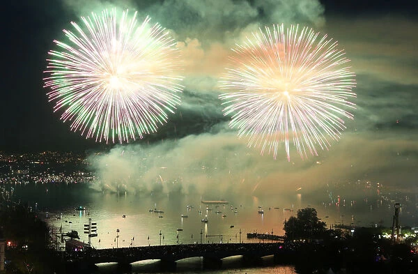 Fireworks explode during the Zueri Faescht festival over Lake Zurich in Zurich