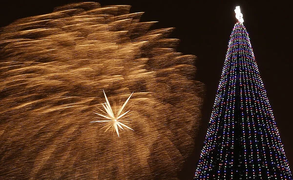 Fireworks light the sky during Orthodox Christmas celebrations in Krasnoyarsk