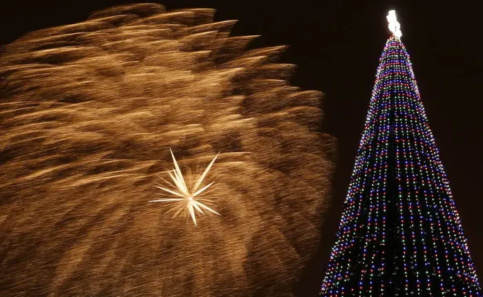 Framed Print : Fireworks light the sky during Orthodox Christmas celebrations in Krasnoyarsk