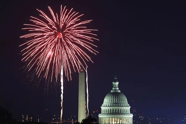 Fireworks light up the sky over the United States Capitol dome and the Washington