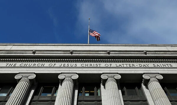 A flag flies at half mask outside the world headquarters of the Mormon Church for Thomas