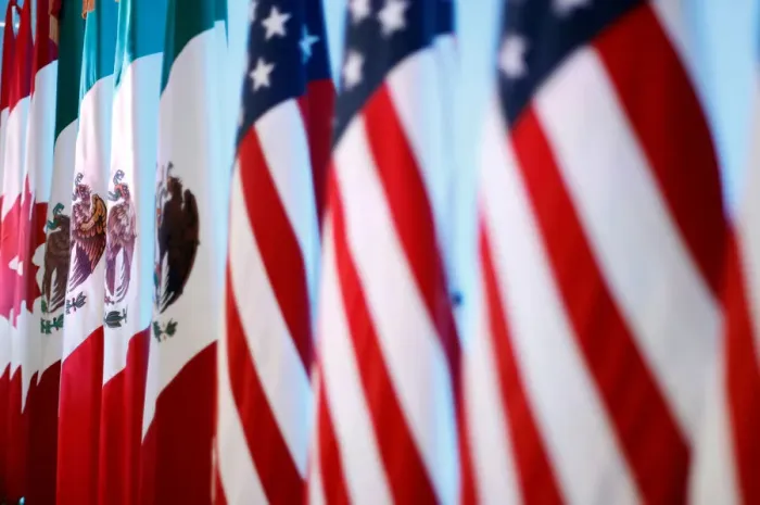 Framed Print : Flags of Canada, Mexico and the U. S. are seen before a joint news conference on Framed Print : Flags of Canada, Mexico and the U. S. are seen before a joint news conference on