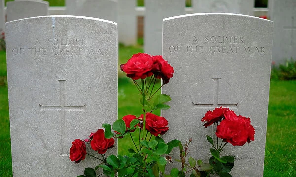 Flowers are placed on headstones at the Bernafay Wood British cemetery ahead of