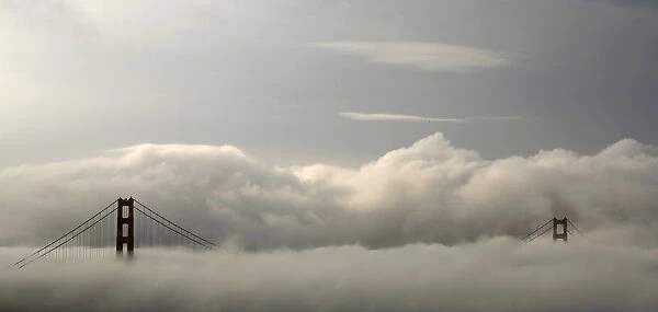 Fog envelops the Golden Gate Bridge in San Francisco, California