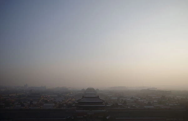 The Forbidden City is seen from the top of Jingshan Park during a heavily polluted day in