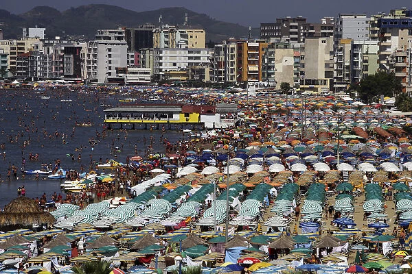 A general view of the crowded beach is seen in the city of Durres