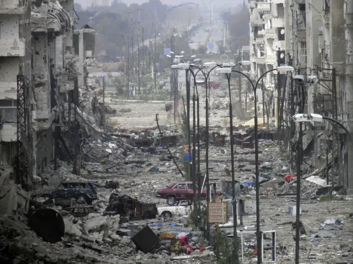 Framed Print : A general view of a deserted and damaged street filled with debris in Homs Framed Print : A general view of a deserted and damaged street filled with debris in Homs