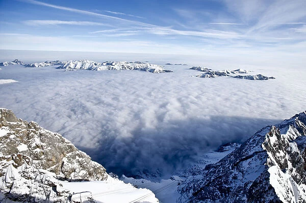 A general view from Germanys highest mountain the Zugspitze, shows fog covered mountain
