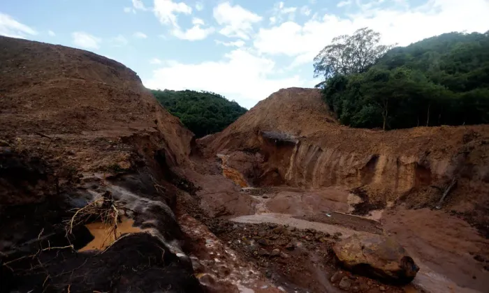 Framed Print : A general view shows the dam that burst its walls, overrunning nearby homes Framed Print : A general view shows the dam that burst its walls, overrunning nearby homes