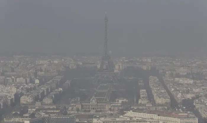 Framed Print : A general view shows the Eiffel tower and the Paris skyline through a small-particle haze Framed Print : A general view shows the Eiffel tower and the Paris skyline through a small-particle haze