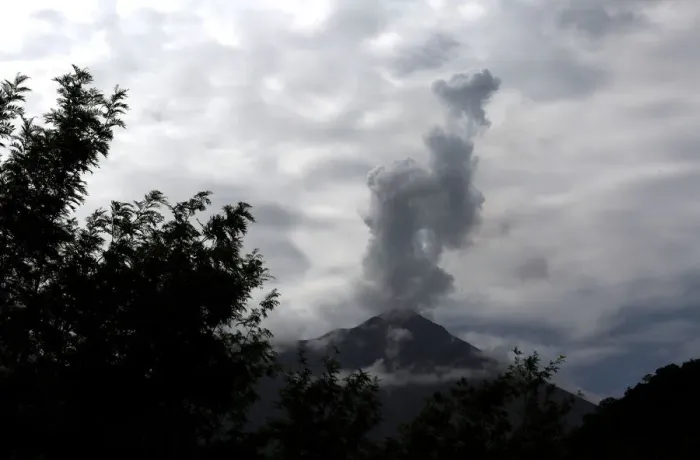 Framed Print : A general view shows the Fuego volcano from Yepocapa in Chimaltenango