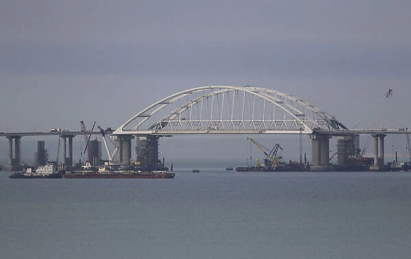 A general view shows a road-and-rail bridge, which is constructed to connect the Russian