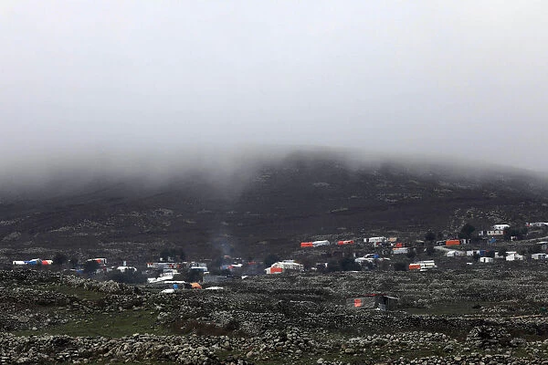 A general view shows tents housing internally displaced people in Quneitra