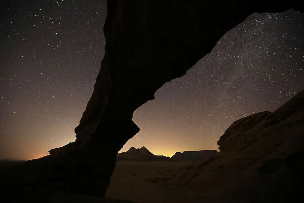 A general view of the stars and mountains at Al-Kharza area of Wadi Rum is seen in the