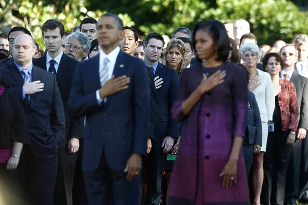 GM1E89B1QCR01. White House staff observe a moment of silence along with U.S