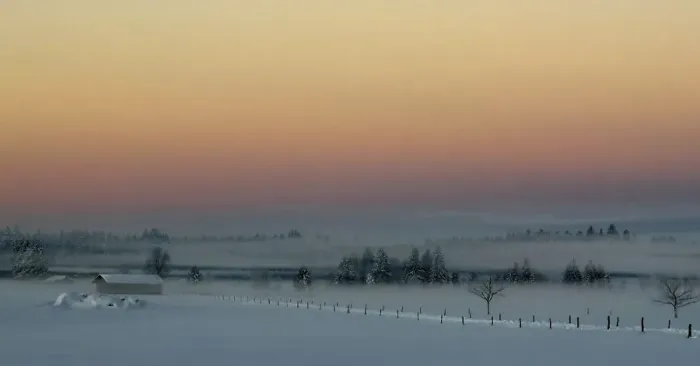 Framed Print : Ground fog lies on a field during the first sunrise of 2015 on a field near Warngau
