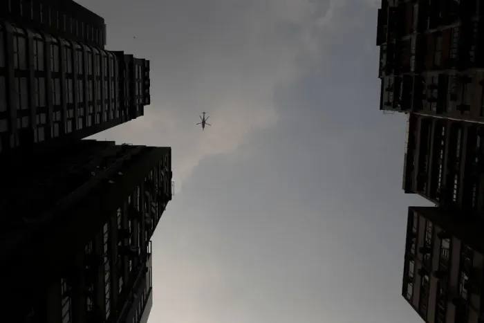 Framed Print : A helicopter flies above an anti-government rally in Wan Chai district, Hong Kong Framed Print : A helicopter flies above an anti-government rally in Wan Chai district, Hong Kong