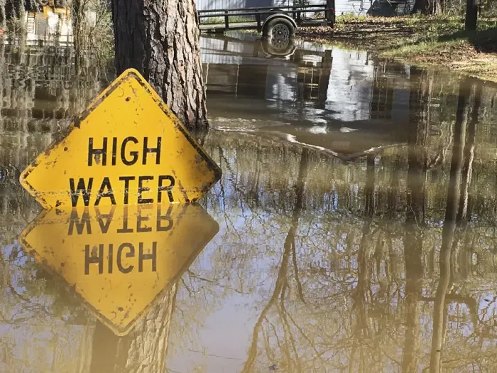 Framed Print : A high water sign is submerged near Lake Bistineau in Webster Parish Louisiana Framed Print : A high water sign is submerged near Lake Bistineau in Webster Parish Louisiana